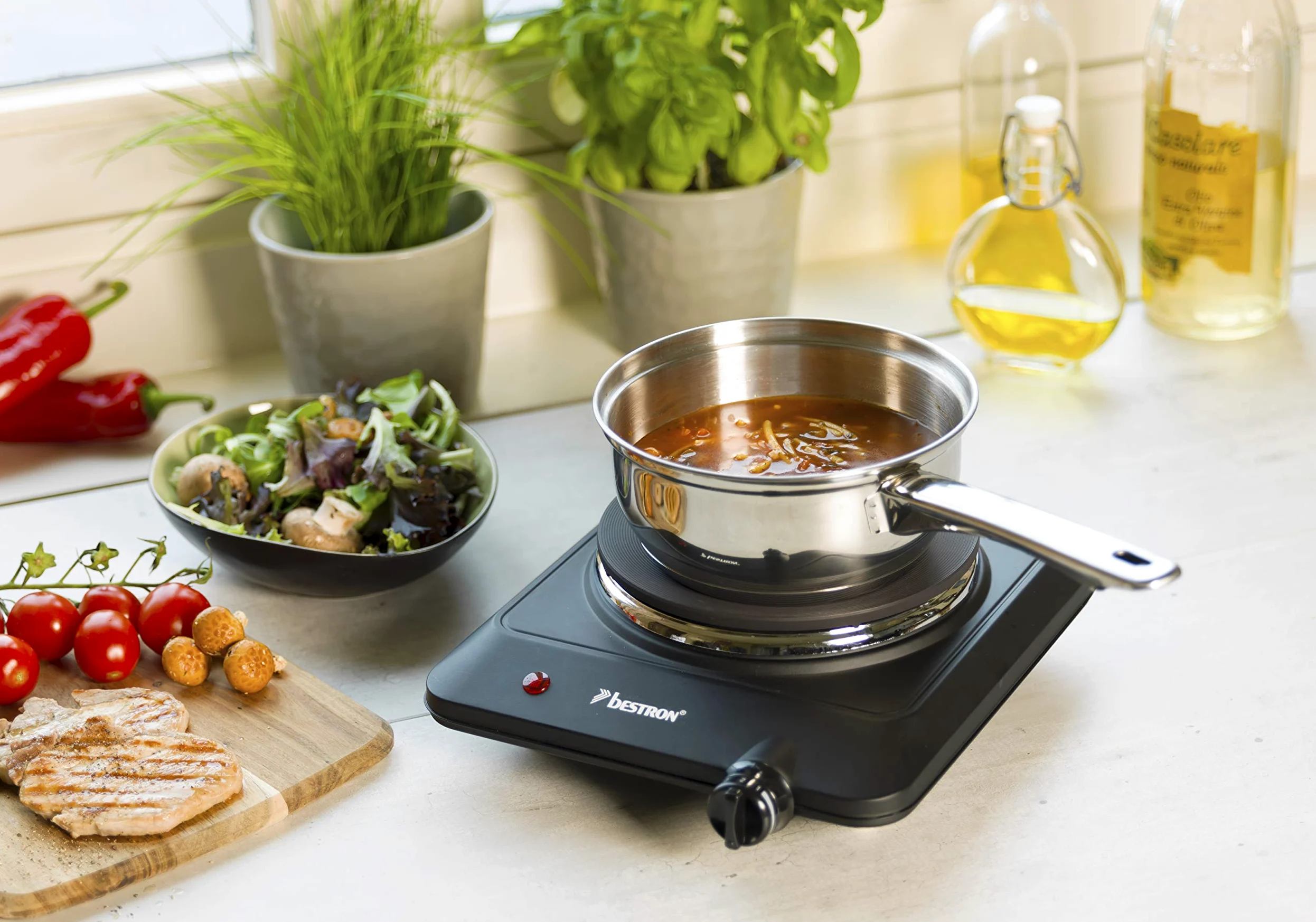 Bestron Plaque de Cuisson Compacte en Fonte, Kitchen Heroes, Ø 18 cm, 1500 Watts, Noir