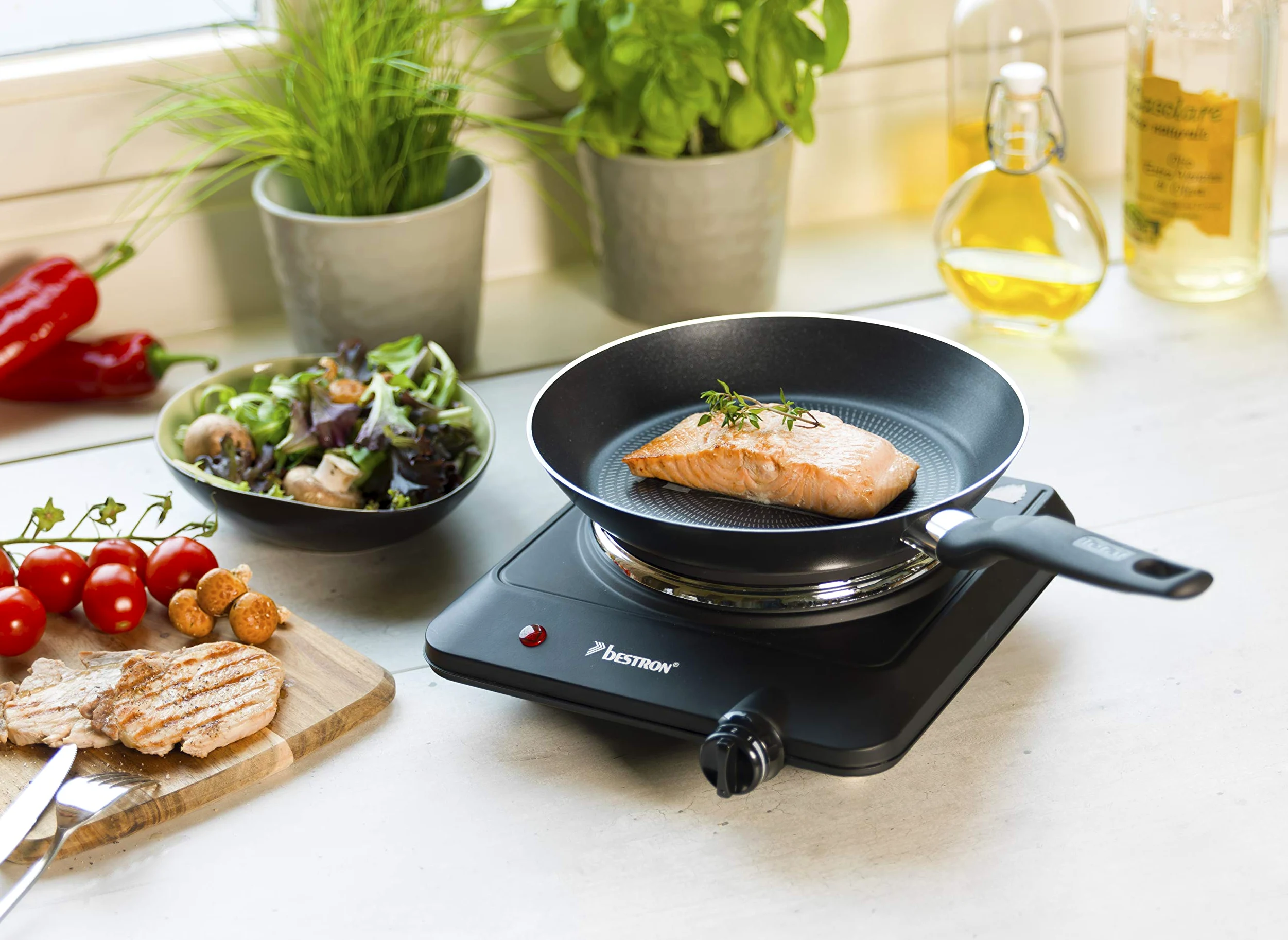 Bestron Plaque de Cuisson Compacte en Fonte, Kitchen Heroes, Ø 18 cm, 1500 Watts, Noir
