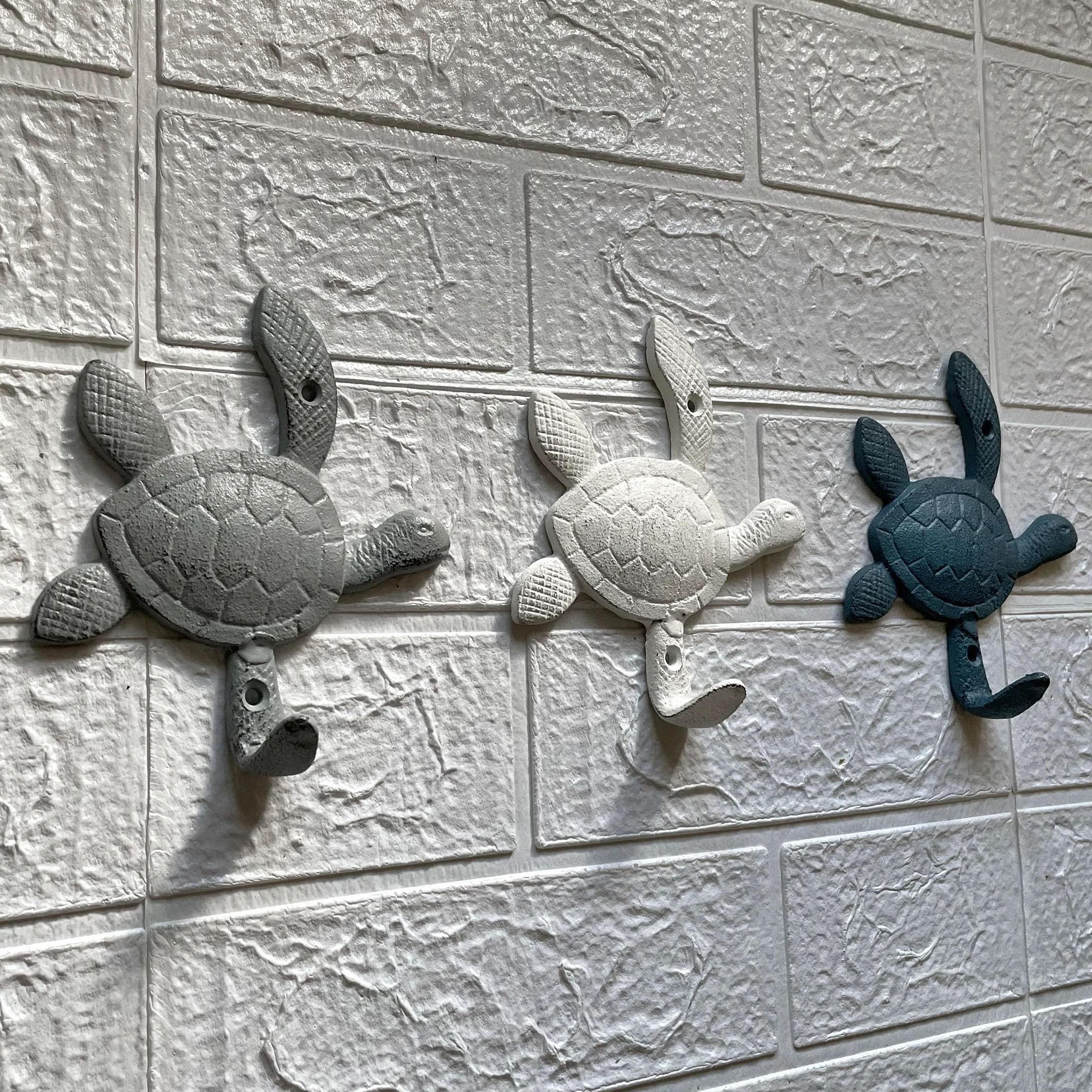 Zeckos Ensemble de crochets muraux décoratifs en fonte - Motif tortue de mer - Bleu côtier - Finition grise et blanche - Idéal pour clés, serviettes, manteaux légers, intérieur/extérieur